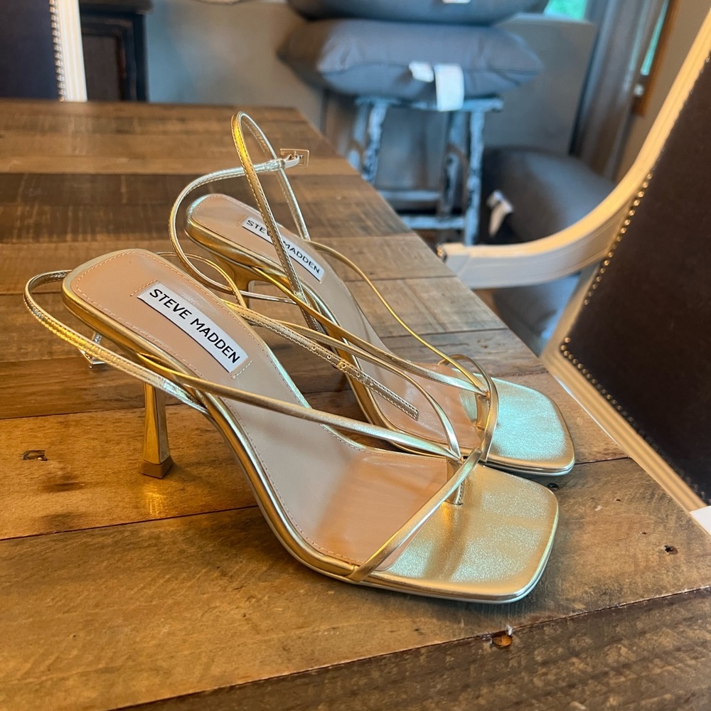 Steve Madden gold heels. Super cute- I received lots of compliments!!!